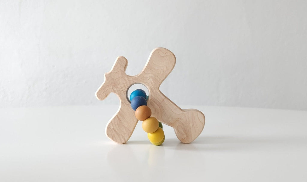 Jouet en bois d'avion à saisir avec billes de dentition