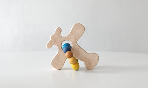 Jouet en bois d'avion à saisir avec billes de dentition