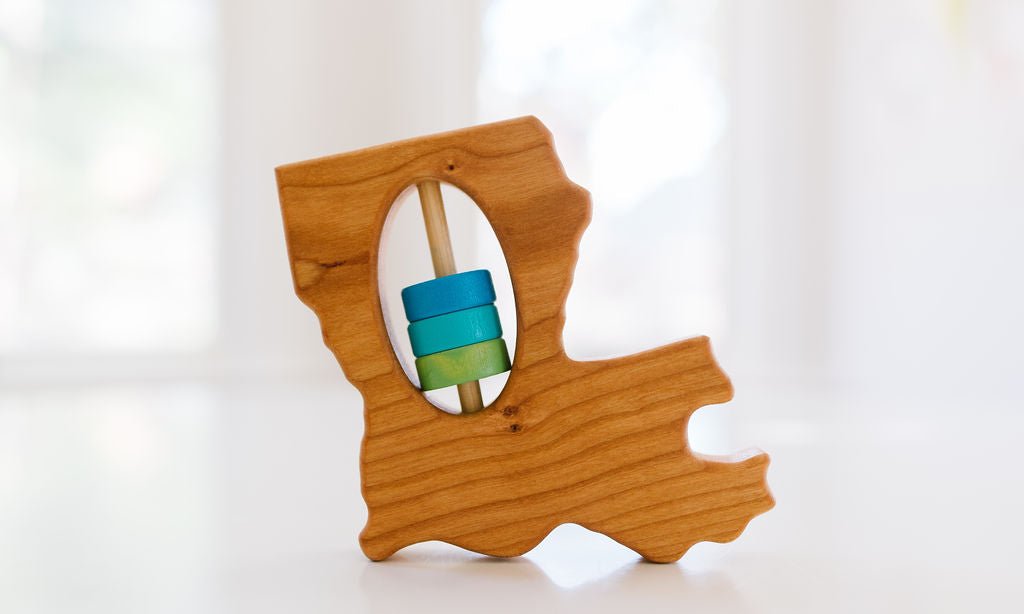 Hochet en bois de l'État de Louisiane pour bébé™