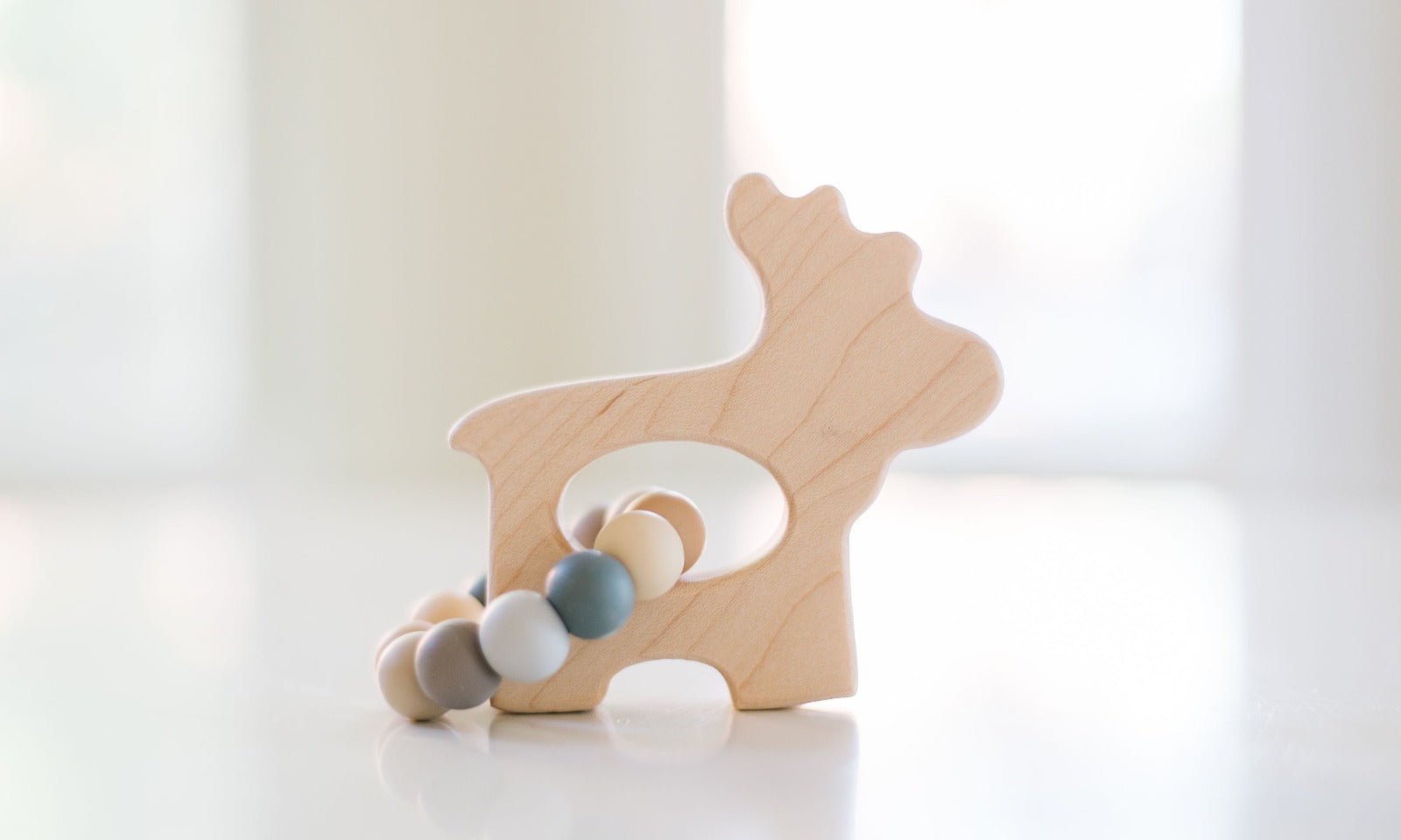 Jouet d'éveil en bois élan avec perles de dentition