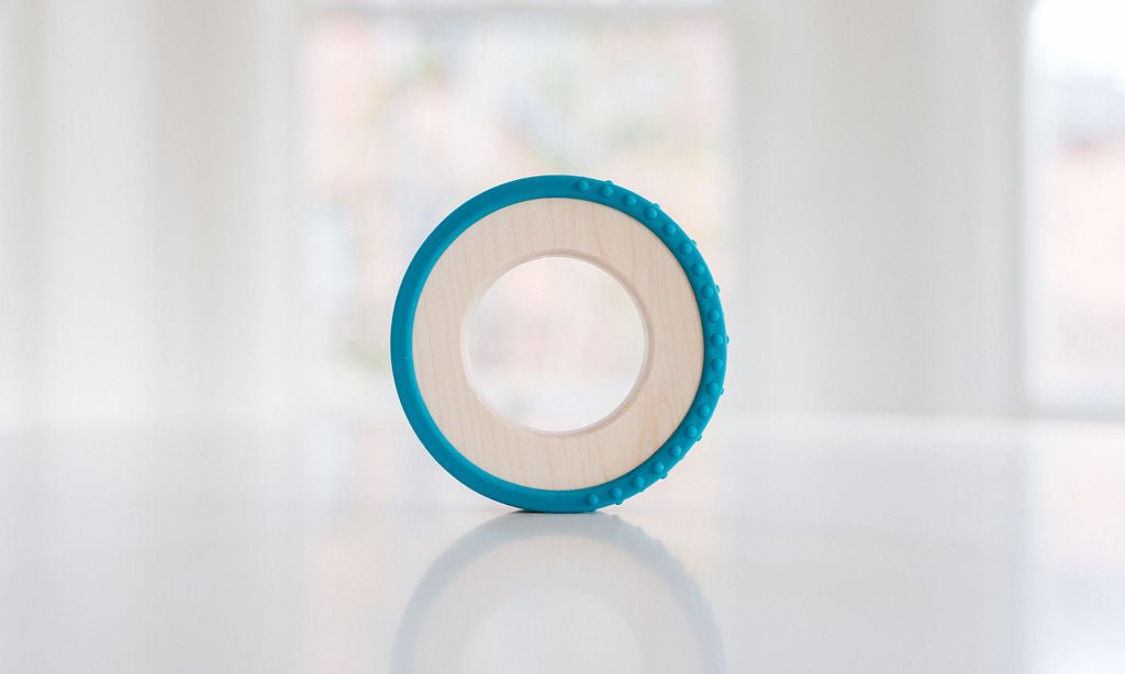 Anneau de dentition enveloppé de silicone