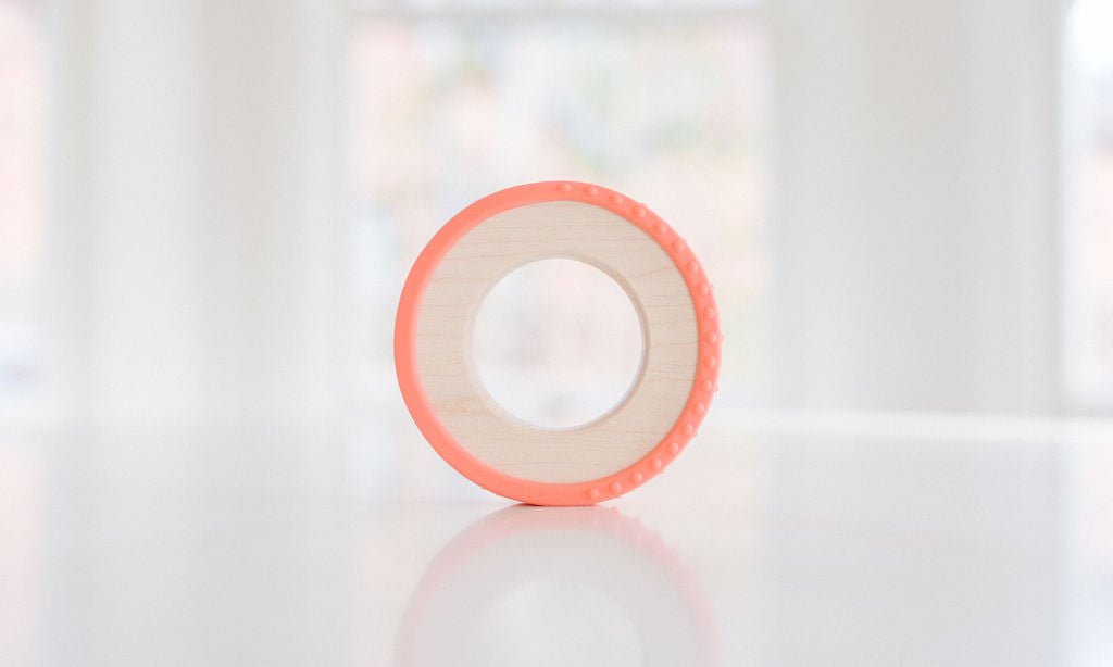 Anneau de dentition enveloppé de silicone