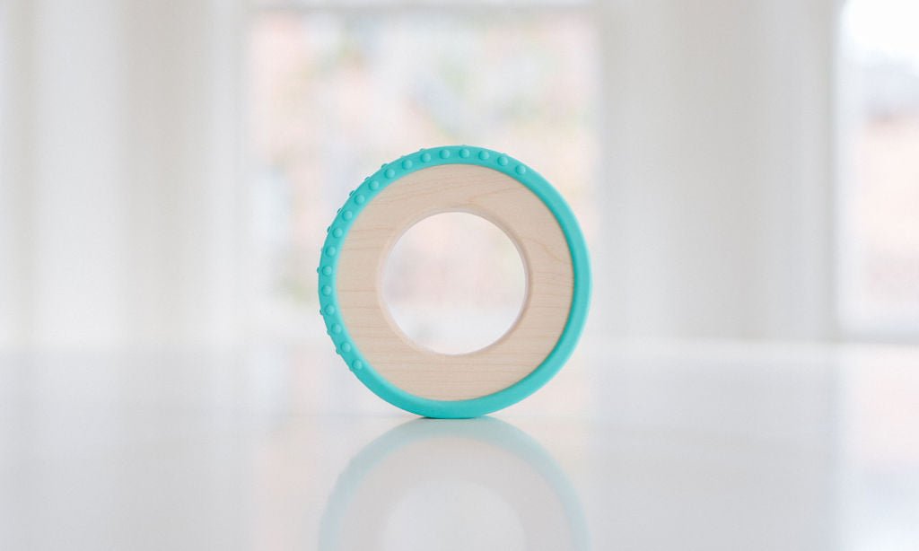 Anneau de dentition enveloppé de silicone