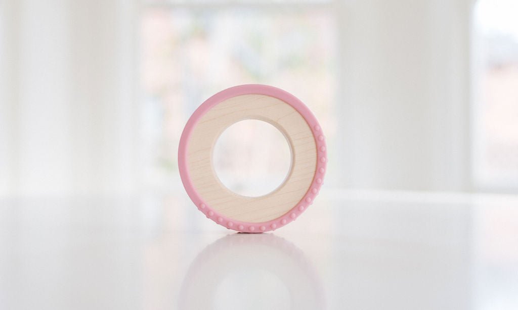 Anneau de dentition enveloppé de silicone