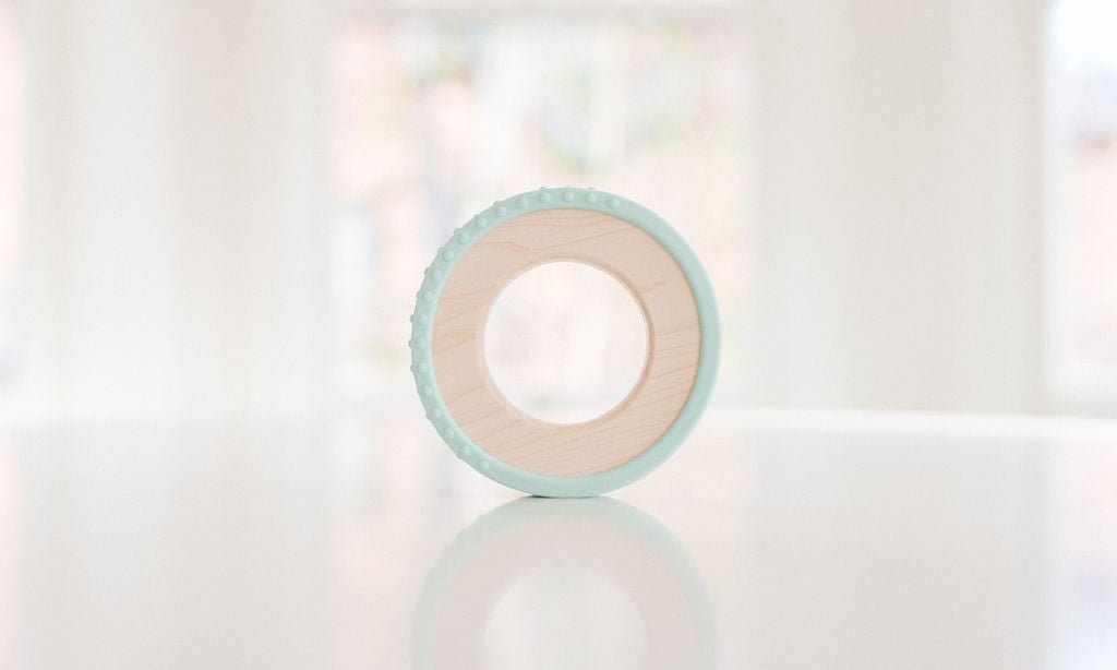 Anneau de dentition enveloppé de silicone