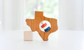 Hochet en bois du Texas pour bébé™