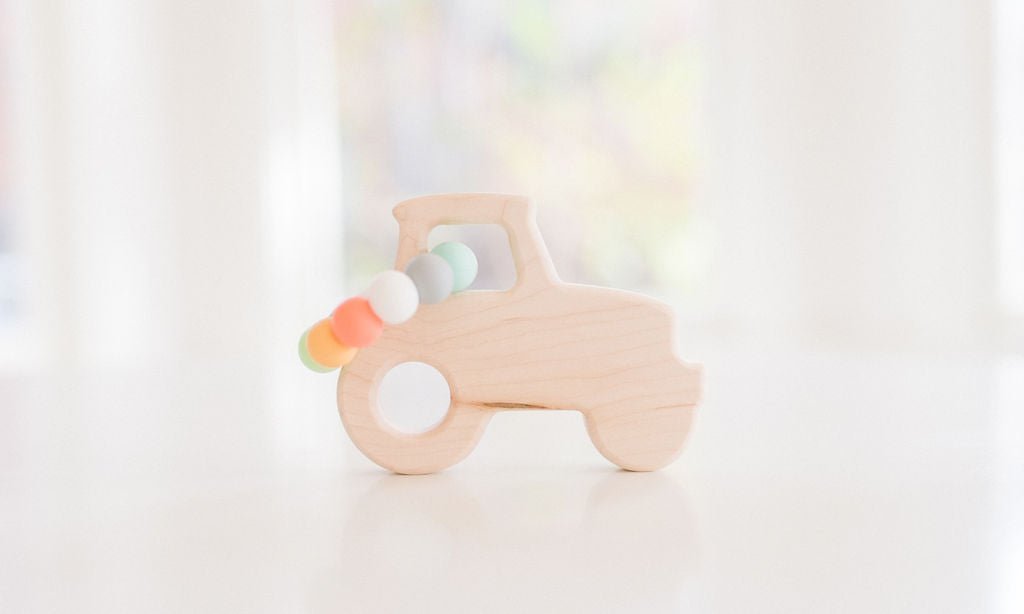 Jouet en bois à saisir tracteur avec perles de dentition